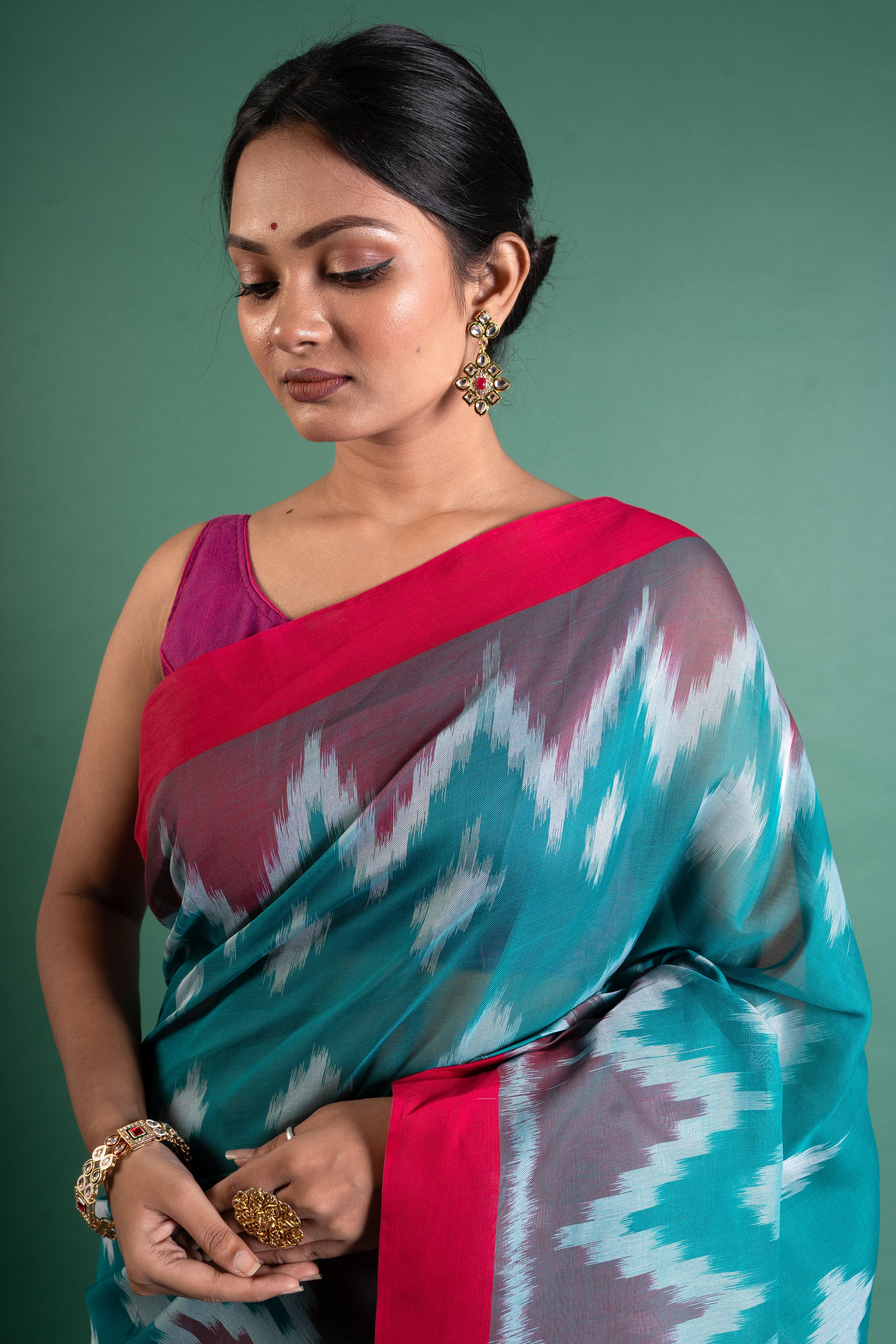Teal & Rani Pink Handloom Ikat Saree