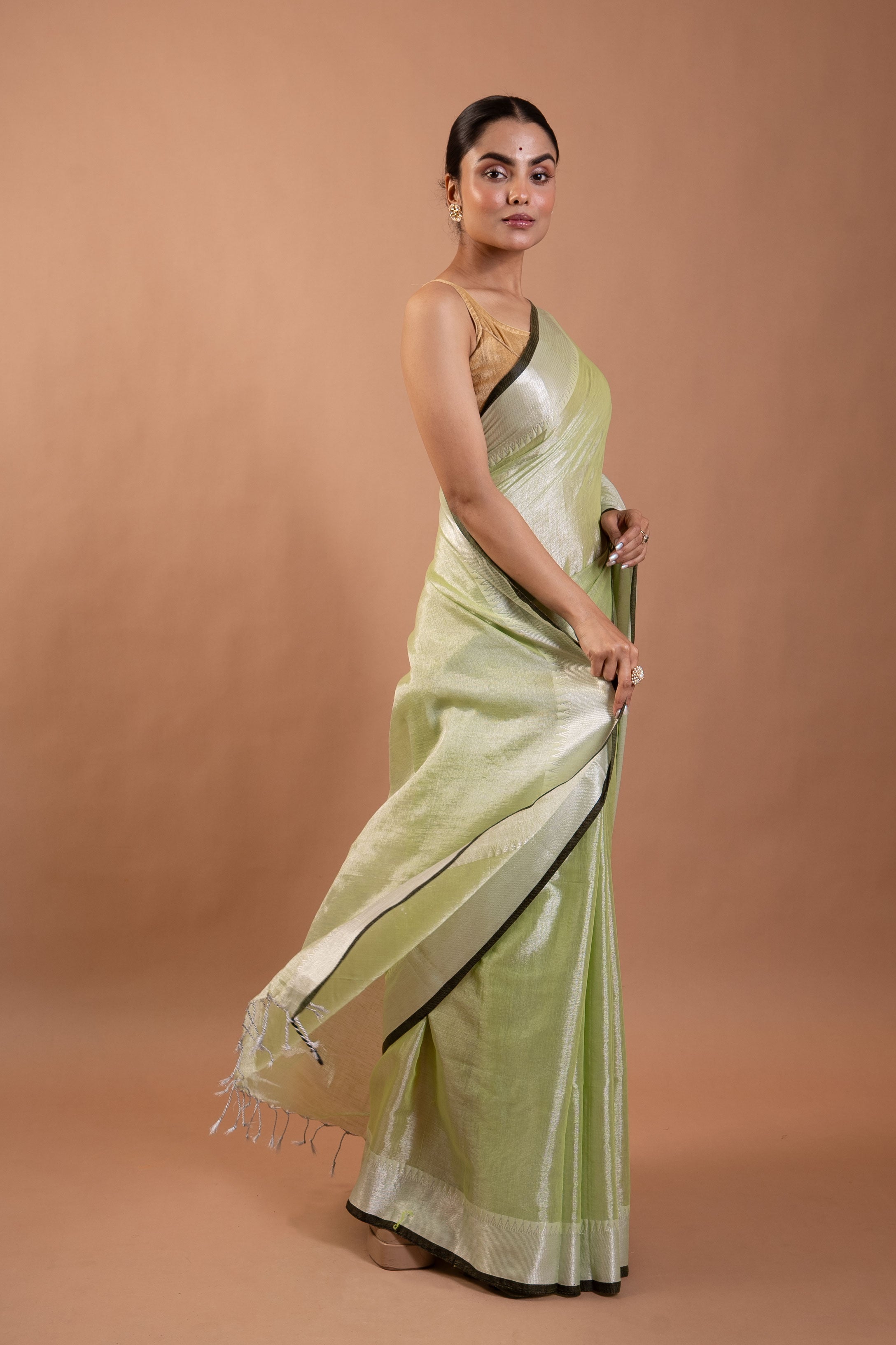 Misty Pistachio Pure Tissue Saree with Silver Sheen Border