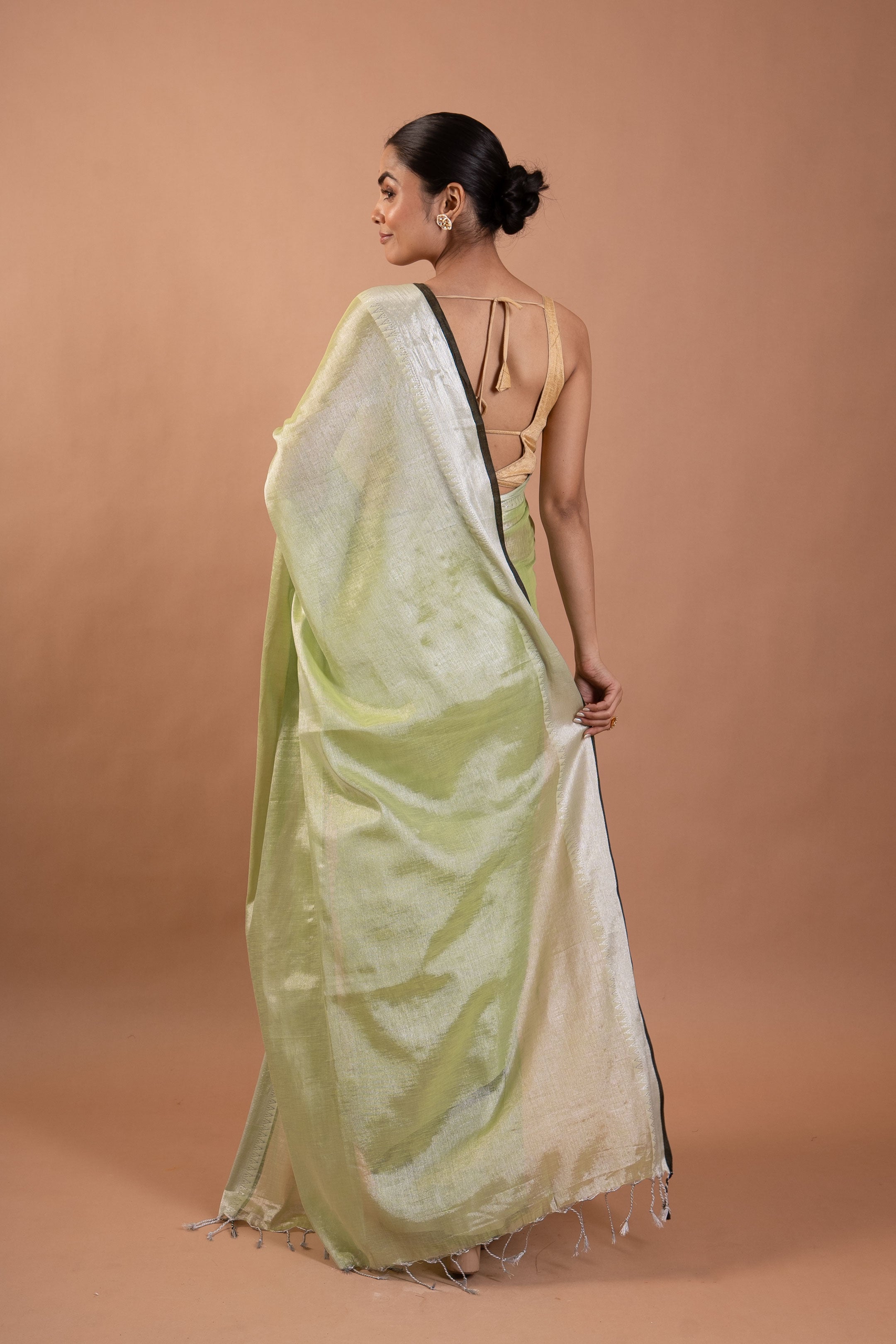 Misty Pistachio Pure Tissue Saree with Silver Sheen Border