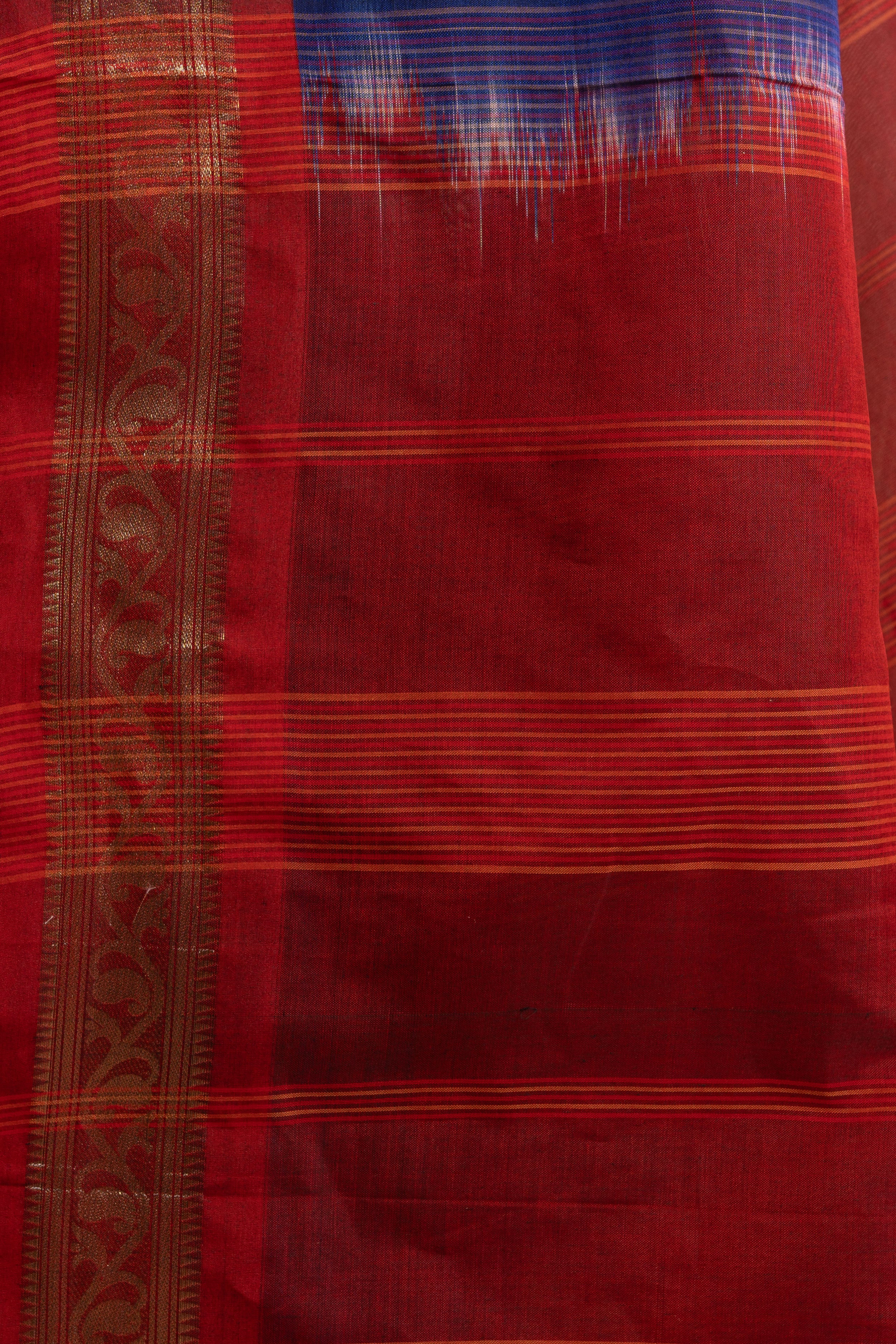 Neelanjali Navy–Red Zari Border Saree