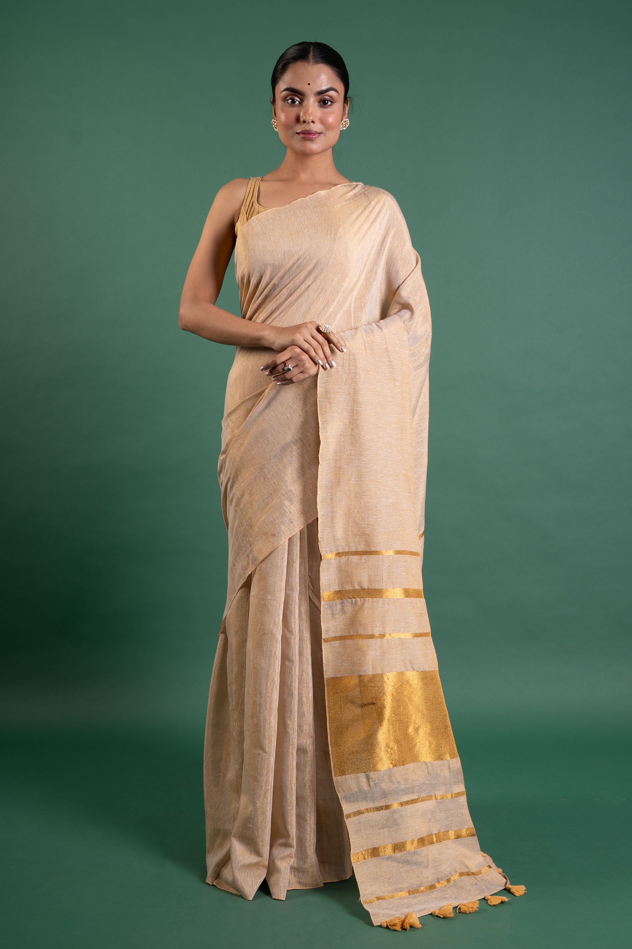 Champagne Glow Pure Tissue Saree with Gold Stripe Pallu