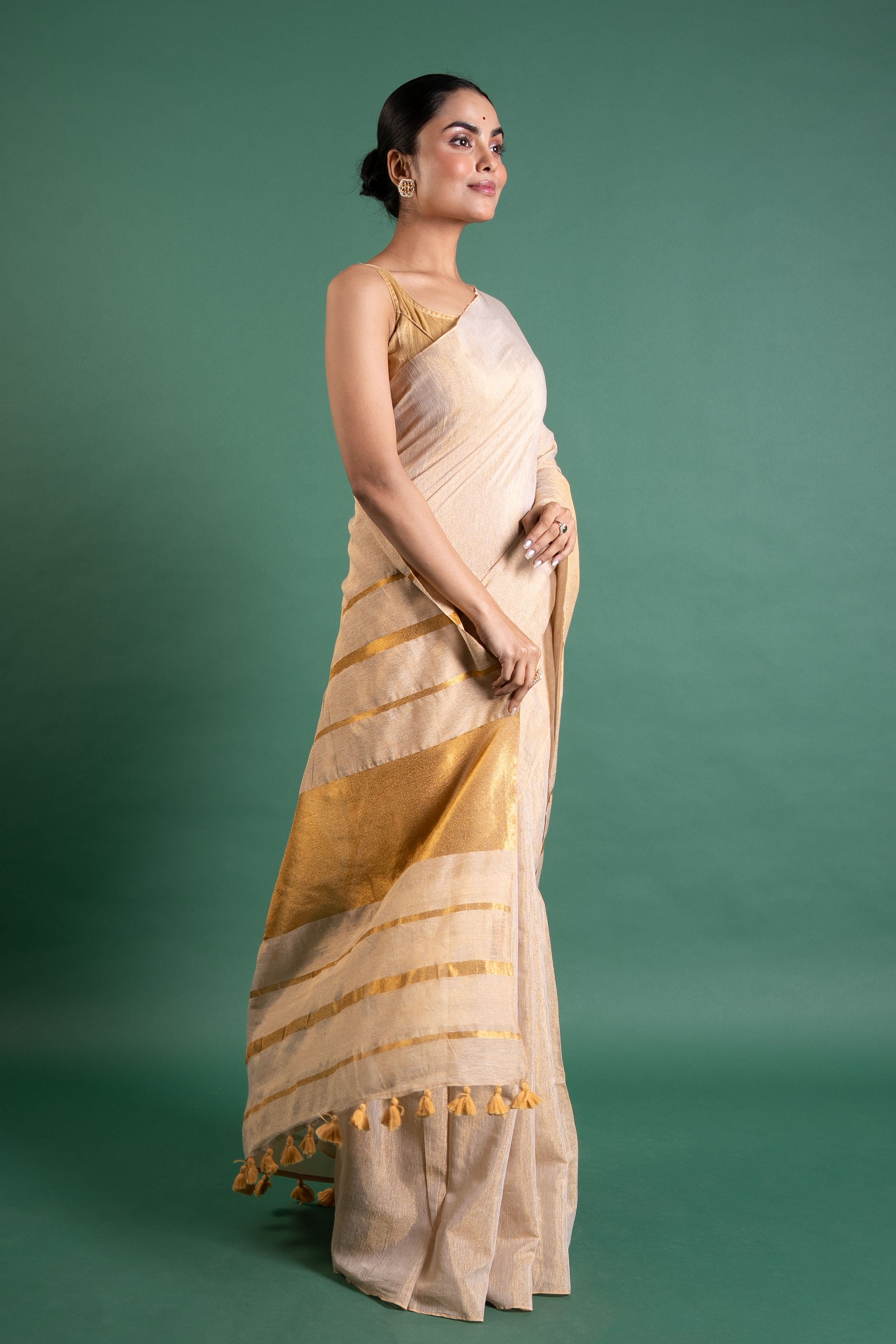 Champagne Glow Pure Tissue Saree with Gold Stripe Pallu
